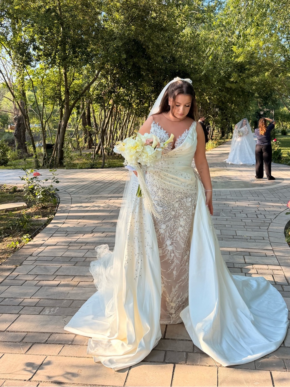 Valdrin Sahiti Elegant Ivory Beaded Bridal Gown with Detachable Train